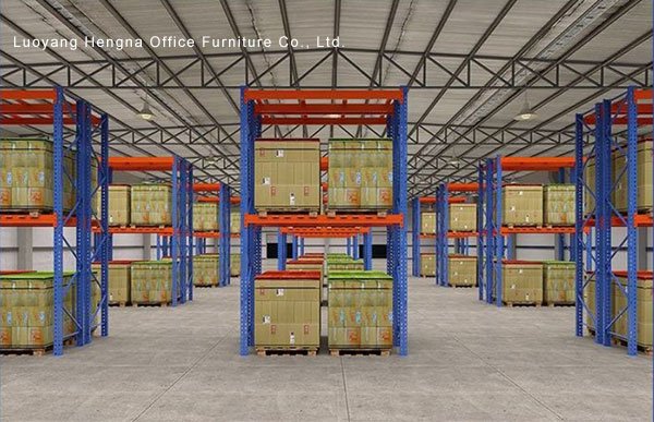 Boltless pallet racking installed in warehouse e-commerce fulfillment center cardboard boxes on pallets organized storage